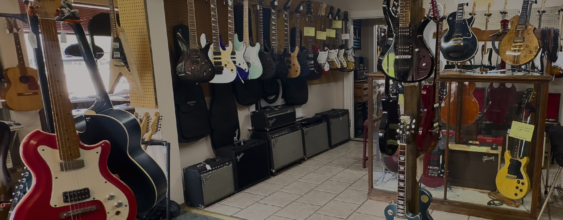 UP GUITARS AND MUSIC